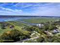 Breathtaking aerial view of property with yellow boundaries on a scenic waterfront location at 185 Wappoo Rd, Charleston, SC 29407