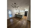 Modern kitchen featuring gray cabinets, stainless steel appliances, and a spacious island at 201 Hayden St St, Walterboro, SC 29488