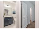 Beautiful bathroom featuring a navy blue vanity, white marble countertop, and modern finishes at 412 Katies Scenic Ct, Charleston, SC 29492