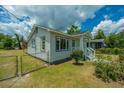 This single story home has a well-maintained lawn and cute covered entryway at 111 Carver St, Walterboro, SC 29488