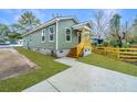 Charming home with a cozy front porch and newly landscaped yard at 2647 Tillman St, North Charleston, SC 29405