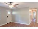 Bright living room with laminate floors, fresh paint, and white trim at 380 Furman Ln, Ladson, SC 29456
