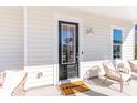 Stylish front door with glass insert and a 'LENNAR' welcome mat at 794 Clay Field Trl, Summerville, SC 29485