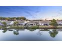 Beautiful aerial view of waterfront homes and scenic landscaping at 1216 Hammrick Ln, Johns Island, SC 29455