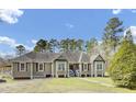 Charming single-story home with colorful shutters and a welcoming entrance at 162 Wal Flo Ln, Moncks Corner, SC 29461