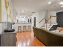 Open concept floor plan from living room looking into kitchen and stairwell at 204 Branch Creek Trl, Summerville, SC 29483