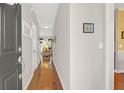 Warm foyer with hardwood floors leading into a spacious living area at 2416 Kings Gate Ln # 403, Mount Pleasant, SC 29466
