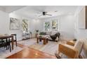 Bright living room with hardwood floors, neutral decor and ceiling fan at 2714 W Surrey Dr, North Charleston, SC 29405