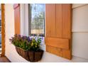 Window detail featuring exterior shutter and flower box at 2714 W Surrey Dr, North Charleston, SC 29405