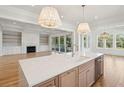 Bright, open-concept kitchen featuring a large island, modern appliances and a view of the living area at 3846 Delinger Dr, Mount Pleasant, SC 29466