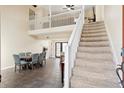 Inviting entryway featuring a staircase, and open floor plan, offering a bright and airy atmosphere at 404 Terrier Rd, Goose Creek, SC 29445