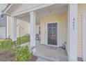 Cozy front porch with welcoming decor and comfortable seating area at 4497 Ocean Farm Dr, Summerville, SC 29485