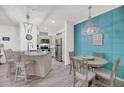 Inviting kitchen with granite counters, stainless appliances, and a charming breakfast nook at 60 Fenwick Hall Allee # 314, Johns Island, SC 29455