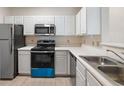 View of the kitchen features stainless steel appliances, a dishwasher, and cabinets at 1600 Long Grove Dr # 1313, Mount Pleasant, SC 29466
