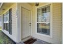 Close-up of a cozy front porch with a decorative welcome mat and charming exterior details at 203 Birmingham Dr, Summerville, SC 29486