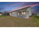 The backyard has a concrete patio and outdoor seating area for relaxing and entertaining at 220 Garden Gate Way, Summerville, SC 29486
