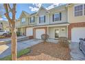 Desirable townhome community with attached garages, inviting entrances, and manicured front yards at 234 Darcy Ave, Goose Creek, SC 29445