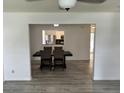 View of the dining room featuring a dark table and chairs open to the kitchen at 415 Aberdeen Cir, Summerville, SC 29483