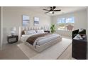 Serene bedroom featuring a plush bed, neutral tones, and ample natural light at 416 Duskywing Dr, Goose Creek, SC 29445