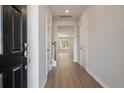 Inviting entryway with wood flooring, modern lighting, and a welcoming atmosphere at 416 Duskywing Dr, Goose Creek, SC 29445