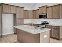 Modern kitchen featuring granite countertops, stainless steel appliances, and ample cabinet space at 419 Grove End Rd, Moncks Corner, SC 29461