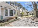 Charming row of homes with a well-maintained yards and green space at 8 Townpark Ln # B, Charleston, SC 29412