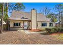 Charming single-Gathering home with a well-maintained lawn and inviting entrance at 100 Traders Station Rd, Summerville, SC 29486