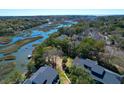 Breathtaking aerial view of a home near serene marshland and lush green trees at 1142 Village Creek Ln # 3, Mount Pleasant, SC 29464