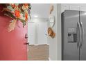 Welcoming entryway featuring a stylish red door and modern stainless steel refrigerator at 1142 Village Creek Ln # 3, Mount Pleasant, SC 29464