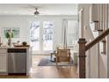 Living room view shows a door to the patio and stairs to the upper floor at 215 Abercom Place Dr, Moncks Corner, SC 29461