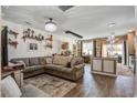 Open-concept living room with stylish decor, hardwood floors, and plenty of space to relax at 509 Nadir Ct, Summerville, SC 29486