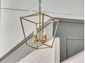 Close-up of a modern, geometric light fixture with elegant design details at 905 Battery Way, Mount Pleasant, SC 29464