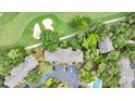 Aerial view showcases the community and lush landscaping near the golf course at 2774 Hidden Oak Dr, Seabrook Island, SC 29455