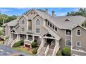 Attractive condo building with well-maintained landscaping and inviting entrance at 2774 Hidden Oak Dr, Seabrook Island, SC 29455