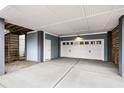 Spacious ground-level garage features a roll-up door and ample storage space at 3726 Apiary Ln, Johns Island, SC 29455