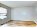 Bright and airy bedroom with wood floors, a window for natural light, and ample space for furniture arrangement at 501 Hedge Way, Summerville, SC 29486