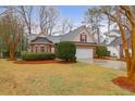 Charming brick home featuring manicured landscaping and an attached two-car garage at 109 Nelson Ct, Summerville, SC 29485