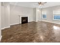 Bright and spacious living room featuring hard wood floors and a fireplace at 139 Gazania Way, Charleston, SC 29414
