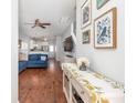 Open-concept living room featuring hardwood floors and bright, neutral paint at 1516 Oldenburg Dr, Mount Pleasant, SC 29466