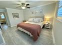 Comfortable main bedroom featuring soft lighting, a ceiling fan, and neutral decor at 1713 Boone Hall Dr # I9, Charleston, SC 29407