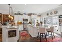 Bright kitchen featuring white cabinets, stainless appliances, and granite countertops at 1930 Carolina Towne Ct, Mount Pleasant, SC 29464