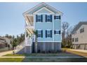 Coastal home featuring a cozy front porch and staircase at 2305 Sturgeon, Johns Island, SC 29455