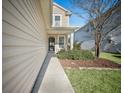 View of the front porch and walkway leading to the entrance at 362 Sanctuary Park Dr, Summerville, SC 29486