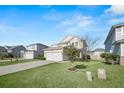 Inviting two-story home with lush lawn, two-car garage, and well-maintained landscaping at 362 Sanctuary Park Dr, Summerville, SC 29486