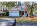 Well-maintained two-story home with a manicured front yard, two car garage and welcoming curb appeal at 635 Fair Spring Dr, Charleston, SC 29414