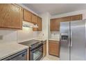 This kitchen features stainless steel appliances and laminate countertops at 158 Commons Way, Goose Creek, SC 29445
