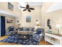 Bright living room with high ceilings, nautical decor, and comfortable seating arrangement at 1638 Live Oak Park, Seabrook Island, SC 29455