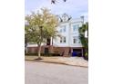 Stylish two-story home with brick facade, a garage, well-maintained lawn, and mature landscaping at 172 Mary Ellen Dr, Charleston, SC 29403