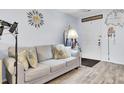 Comfortable living room with a plush sofa, decorative accents, and an inviting atmosphere at 402 Pine Bluff Dr, Summerville, SC 29483