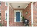 Charming blue front door with decorative glass and a cozy bench at 1278 Deep Water Dr, Mount Pleasant, SC 29464